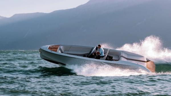 photo of Porsche launches a sleek, $590,000 speedboat with electric Macan power image