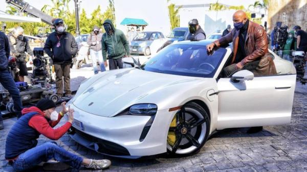 photo of Dwayne 'The Rock' Johnson can't fit in a Porsche Taycan image