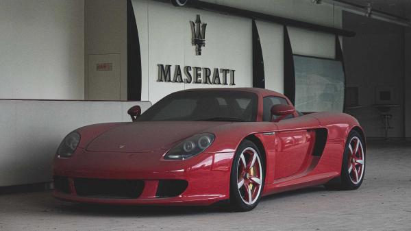photo of Abandoned Porsche Carrera GT At Chinese Dealership Will Make You Cry image