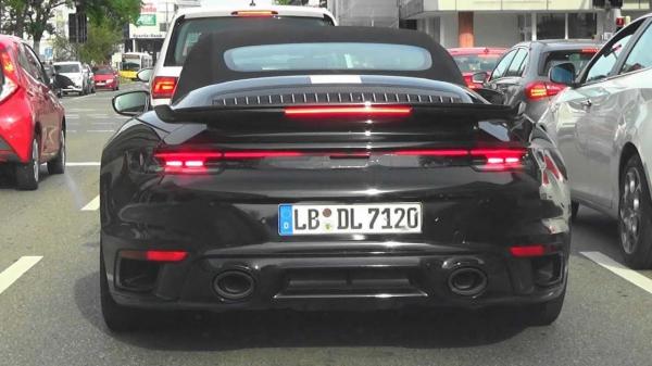 photo of New Porsche 911 Turbo Cabrio Caught In Traffic With Minimal Camo image