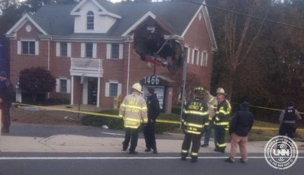 photo of New Jersey Driver Crashes Porsche Into Second Floor Of Building Leaving Two Dead image