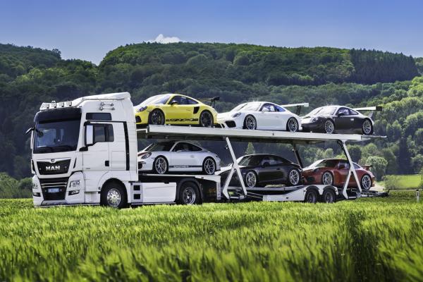 There Is a Truck Full of Porsche Cars…